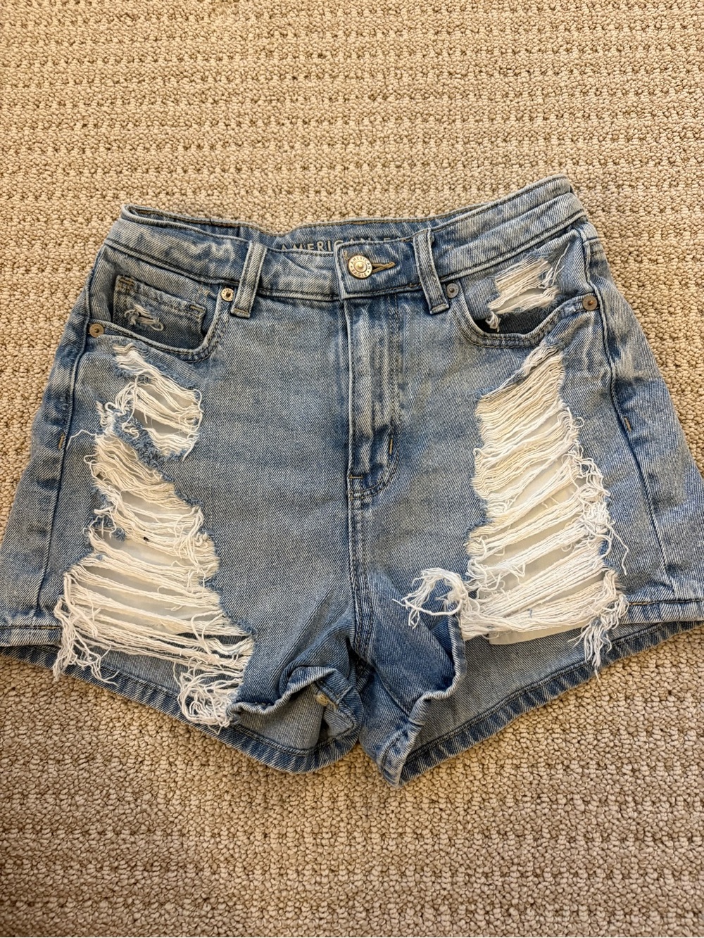 American Eagle Outfitters Light Blue High-Rise Ripped Denim Shorts
